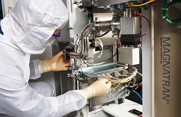 Service engineer carrying out maintenance on a system