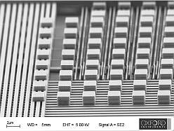 Top dielectric layer removed, exposing four metal layers